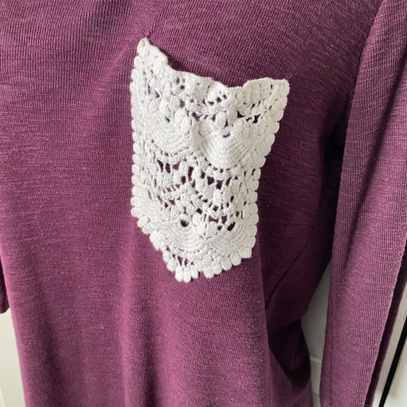 Go Wild top mid sleeves. Pocket in front. Size Med. - Picture 3 of 7